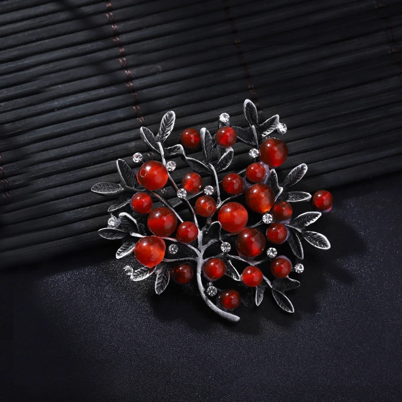 Broszka z czerwonym kryształem – Women Accessories Bouquet recenzja i cena