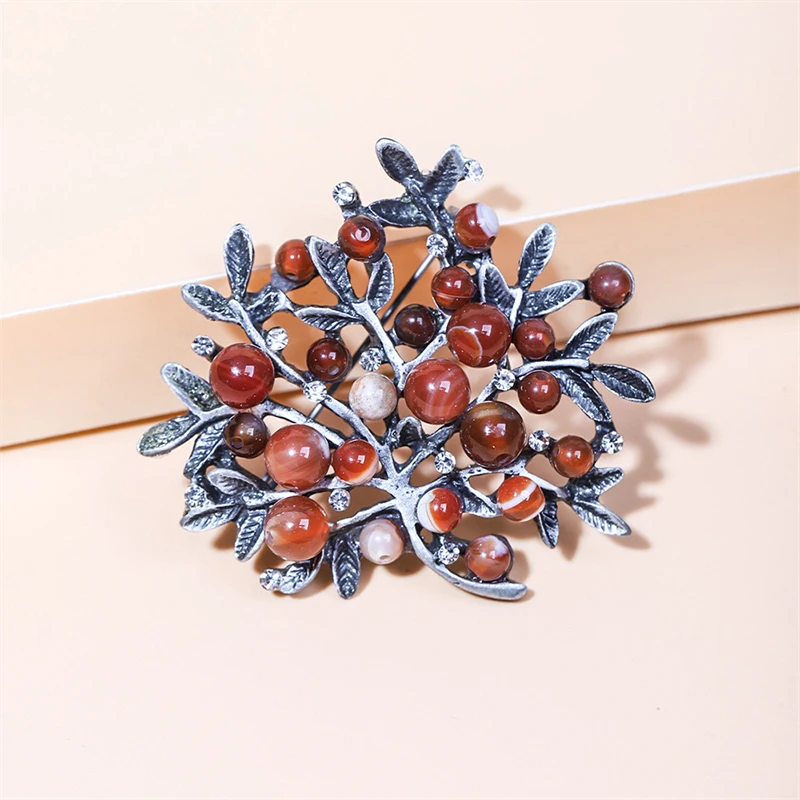 Broszka z czerwonym kryształem – Women Accessories Bouquet recenzja i cena
